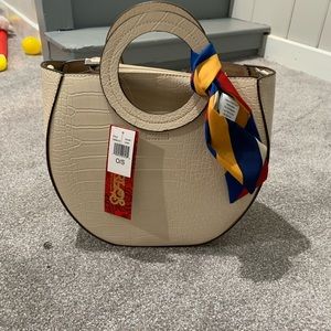 Carlos Santana purse